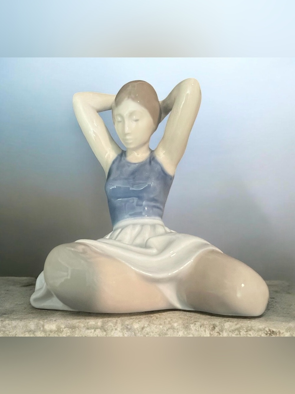Vintage Royal Copenhagen porcelain figure 'Girl Dressing Hair" by John Galster.